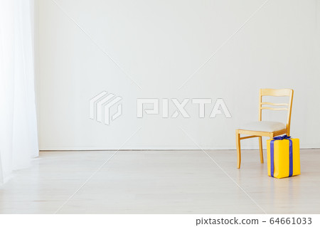 one chair with a gift in the interior of a white empty room 64661033