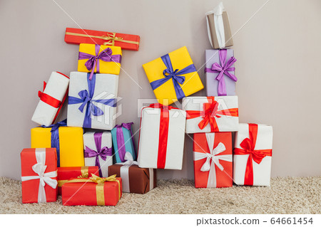 lots of multi-colored gifts on a gray background lots of multi-colored gifts on a gray background 64661454