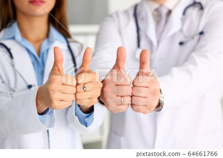 Group of doctor hands show OK or confirm sign Group of doctor hands show OK or confirm sign 64661766
