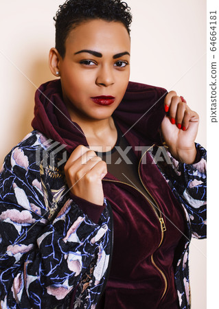 pretty stylish african american big woman well dressed. swag relax at home, fashion look clothers 64664181