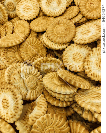 lots of pastry cookies for eating like a background 64664374