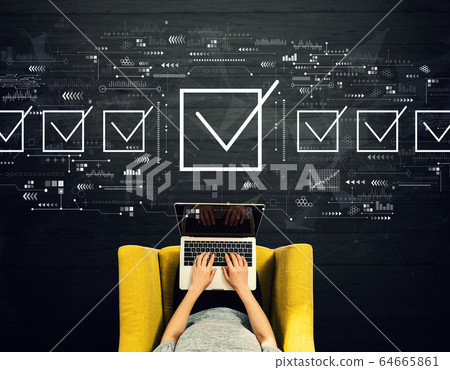 Checklist concept with person using a laptop Checklist concept with person using a laptop 64665861