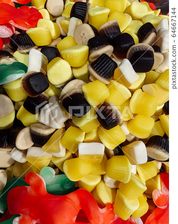 lots of delicious sweet candies to eat like a background 64667144