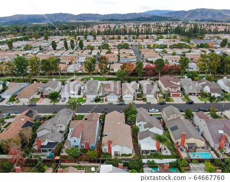 Aerial view of large-scale residential neighborhood, Irvine, California Aerial view of large-scale residential neighborhood, Irvine, California 64667760