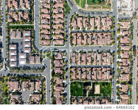 Aerial view suburban neighborhood with identical villas next to each other. San Diego, California 64668102