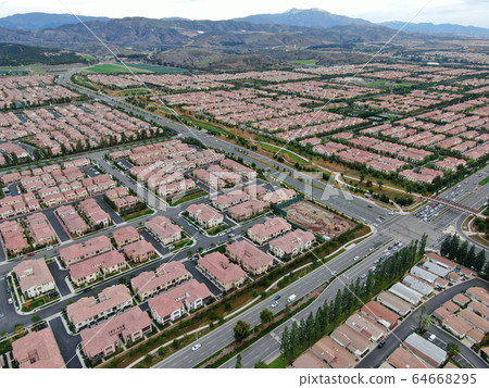 Aerial view of large-scale residential neighborhood, Irvine, California Aerial view of large-scale residential neighborhood, Irvine, California 64668295
