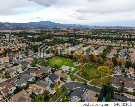 Aerial view of large-scale residential neighborhood, Irvine, California Aerial view of large-scale residential neighborhood, Irvine, California 64668306