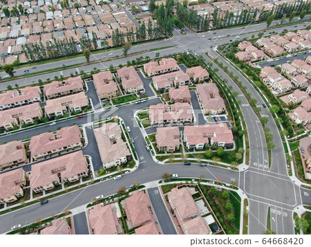 Aerial view of large-scale residential neighborhood, Irvine, California Aerial view of large-scale residential neighborhood, Irvine, California 64668420