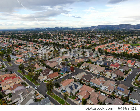 Aerial view of large-scale residential neighborhood, Irvine, California Aerial view of large-scale residential neighborhood, Irvine, California 64668421