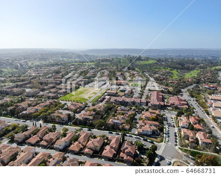 Aerial view suburban neighborhood with identical villas next to each other. San Diego, California Aerial view suburban neighborhood with identical villas next to each other. San Diego, California 64668731