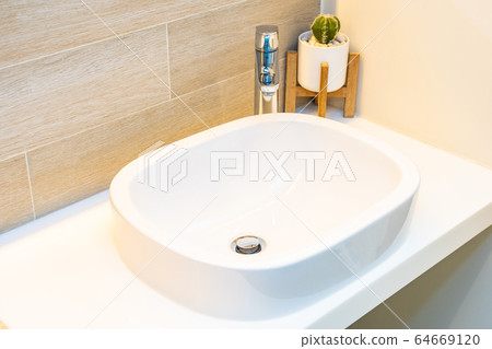 Water facuet and white sink decoration interior Water facuet and white sink decoration interior 64669120