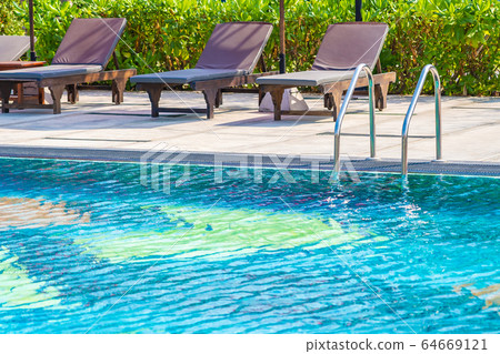 Stair around outdoor swimming pool in hotel resort Stair around outdoor swimming pool in hotel resort 64669121