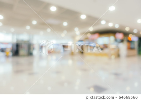 Abstract blur and defocus shopping mall in department store interior Abstract blur and defocus shopping mall in department store interior 64669560