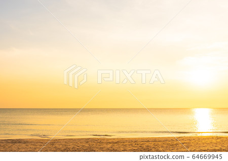 Beautiful tropical nature beach sea ocean at sunset or sunrise Beautiful tropical nature beach sea ocean at sunset or sunrise 64669945