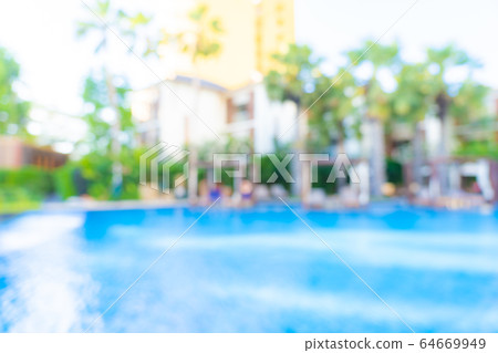 Abstract blur and defocus outdoor swimming pool in hotel resort for background Abstract blur and defocus outdoor swimming pool in hotel resort for background 64669949