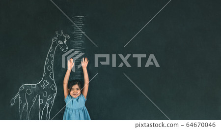 Child measures height Child measures height 64670046