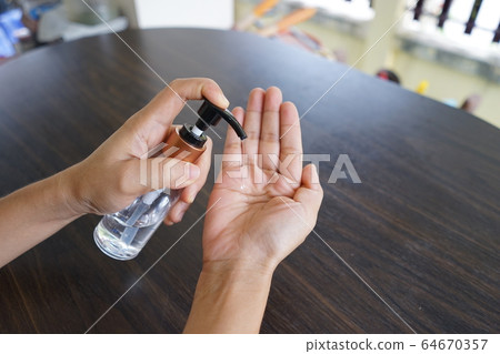Wash hands with alcohol gel. To prevent the coronavirus outbreak covid-19 64670357