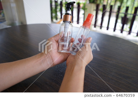 Wash hands with alcohol gel. To prevent the coronavirus outbreak covid-19 64670359