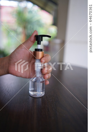 Wash hands with alcohol gel. To prevent the coronavirus outbreak covid-19 Wash hands with alcohol gel. To prevent the coronavirus outbreak covid-19 64670361