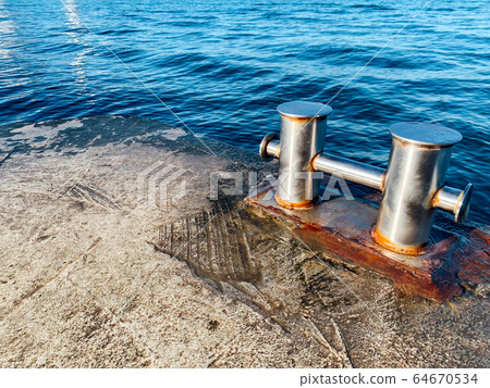 Knecht for mooring ship on the dock Knecht for mooring ship on the dock 64670534