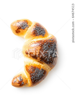 Sweet homemade croissant with poppy. 64674513