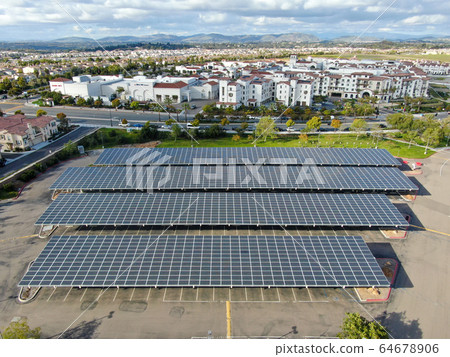 Aerial view of solar power plant installed on top of a parking lot. Aerial view of solar power plant installed on top of a parking lot. 64678906