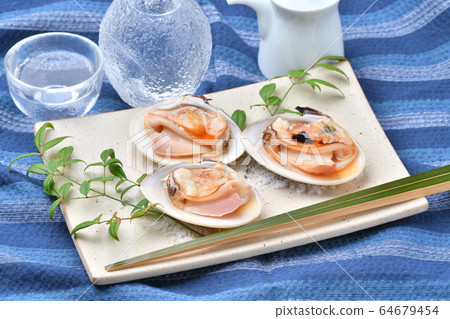 Grilled clams, grilled clams, grilled clams. Grilled a large domestic clam. Seafood grilled. 64679454
