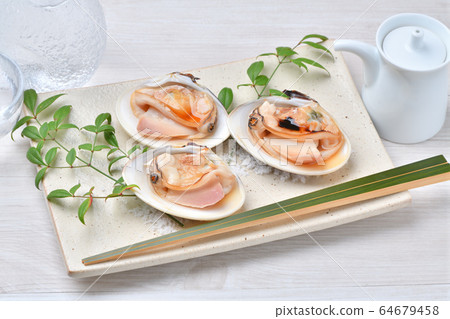 Grilled clams, grilled clams, grilled clams. Grilled a large domestic clam. Seafood grilled. 64679458