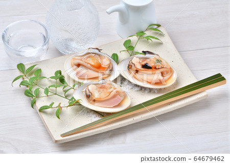 Grilled clams, grilled clams, grilled clams. Grilled a large domestic clam. Seafood grilled. Grilled clams, grilled clams, grilled clams. Grilled a large domestic clam. Seafood grilled. 64679462