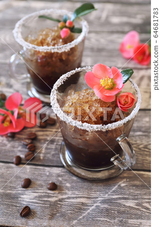 Coffee granita, frozen summer dessert in two cups Coffee granita, frozen summer dessert in two cups 64681783