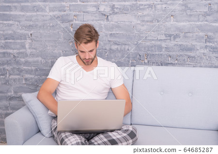 Social distancing. Man work laptop. Online Social distancing. Man work laptop. Online 64685287