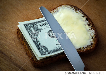 Butter and money on bread Butter and money on bread 64686419