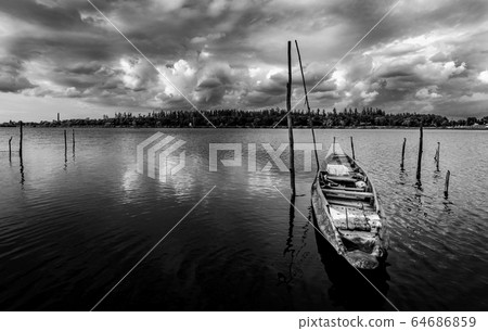 Fishing boat with view of landscape nature in sky 64686859