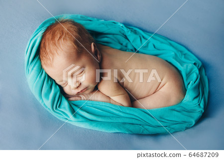 the concept of healthy lifestyle, IVF - a newborn baby sleeps under a blanket. Copy space the concept of healthy lifestyle, IVF - a newborn baby sleeps under a blanket. Copy space 64687209