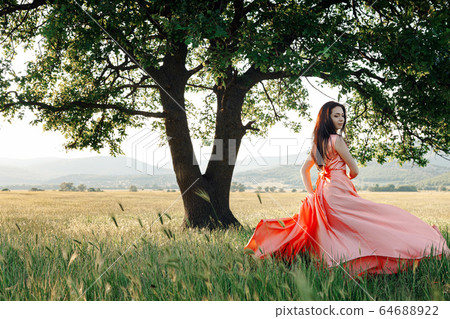Beautiful Active Free Girl on Summer Green Outdoor Beautiful Active Free Girl on Summer Green Outdoor 64688922