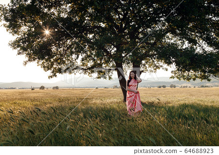 Beautiful Active Free Girl on Summer Green Outdoor Beautiful Active Free Girl on Summer Green Outdoor 64688923