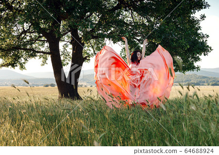Beautiful Active Free Girl on Summer Green Outdoor Beautiful Active Free Girl on Summer Green Outdoor 64688924