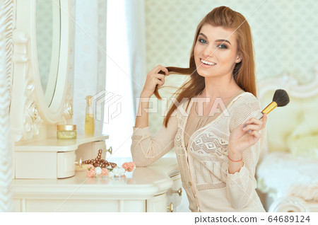 Close up portrait of beautiful young woman Close up portrait of beautiful young woman 64689124