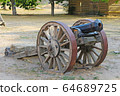 An old cannon on wheels 64689725