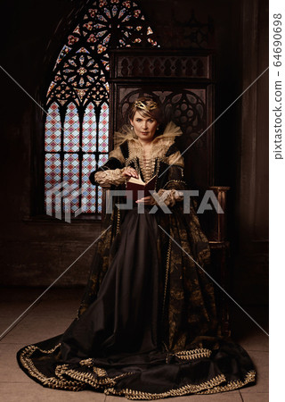 Mature woman in costume of queen Mature woman in costume of queen 64690698