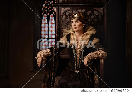 Mature woman in costume of queen Mature woman in costume of queen 64690700