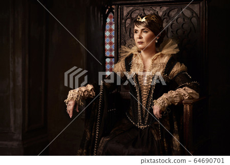 Mature woman in costume of queen Mature woman in costume of queen 64690701