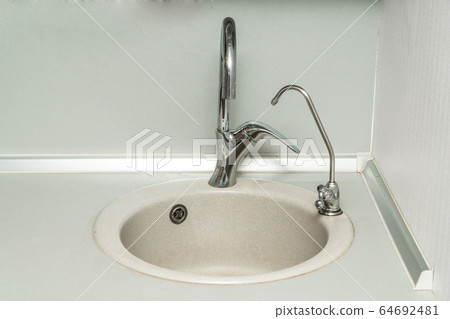 The photo of a sink in a The photo of a sink in a  64692481