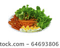 Lettuce, carrots, tomatoes and boiled eggs on the plate with clipping path 64693806