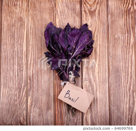 Different fresh herbs on wooden background Different fresh herbs on wooden background 64699769