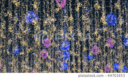Hanging illumination on the streets of city. 64701653