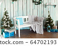 Interior of the veranda of a private house before the Christmas holidays. White bench with a plaid. 64702193