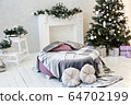 The interior of a beautiful bedroom, in a modern style, decorated with New Year's decor.  64702199