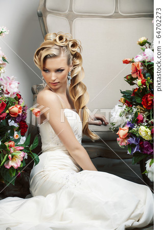 beauty young bride alone in luxury vintage interior with a lot of flowers, makeup and creative hairstyle beauty young bride alone in luxury vintage interior with a lot of flowers, makeup and creative hairstyle 64702273