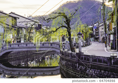 Kinosaki Onsen town in the morning Kinosaki Onsen town in the morning 64704898